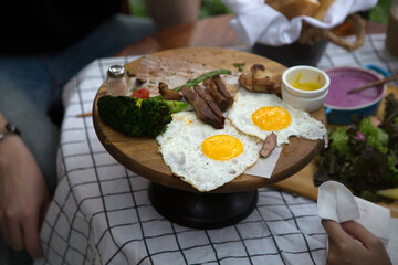 Coffee shop with wooden tables.