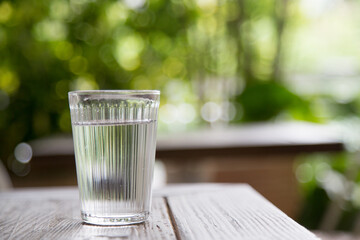 Water glass, water, holding a water glass