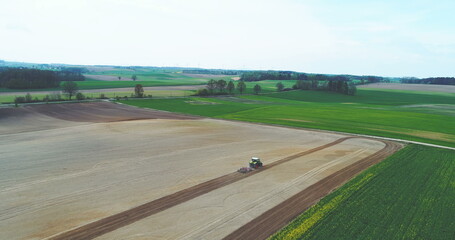Tractor Plowing Field