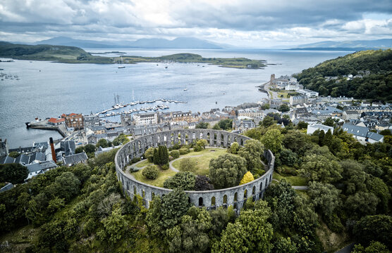 Aerial view of McCaigs Tower, Oban, Oban town centre, the Isles of Kerrera and Mull