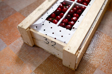 Box made of wooden slats for transporting cherries