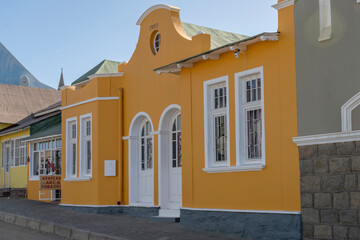 picturesque old mellow yellow building at historical town, Luderitz,  Namibia