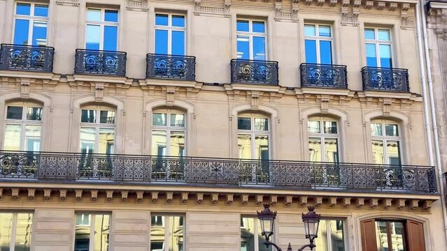 Architecture in central Paris. Haussmannian - real estate immo property in central part of the city near Champs Elysee - large French balconies
