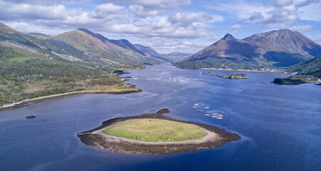 A view up Loch Linnhe towards Glencoe, the Pap of Glencoe, Ben Nevis and Fort William, Highlands, Scotland.