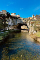 Puentedey, a picturesque village with a natural bridge over the river. Burgos, Castile and Leon, Spain. High quality photography.