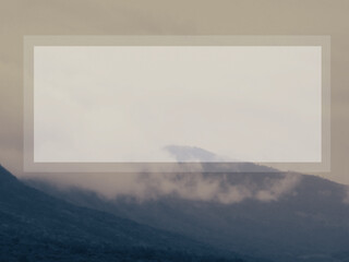 Copy space, white title banner on rainy season mountain background.