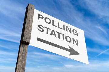 Sign on a wooden pole pointing the location of a polling station under blue sky. Illustration of the concept of voting and election