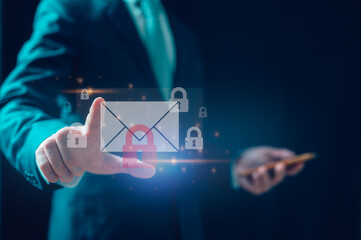 email online security concept Businessman holding icon email and padlocks show cybersecurity and...
