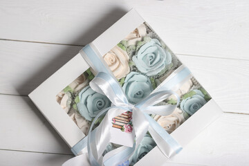 Zephyr in closed gift boxes.  Spruce cones from zephyr and Flowers from zephyr. Homemade zephyr.