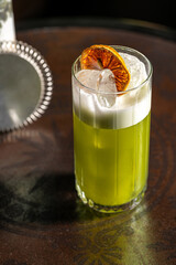 Luxury cocktail on the wooden table on a dark background