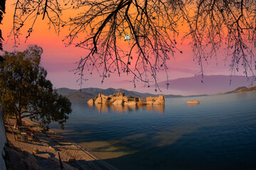 Different views of Bafa Lake in Aegean province of Turkey, boats pier island with monastery and...