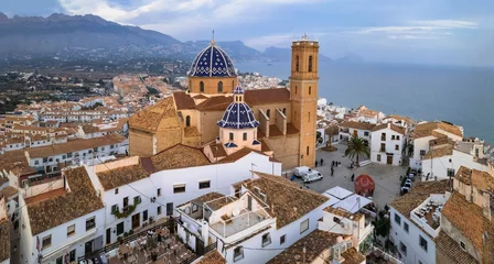 Poster Im Rahmen Charmig coastal town Altea in popular coast of Spain Costa Blanca. aerial drone high angle panoramic view with scenic cathedral, Valencia province. © Freesurf
