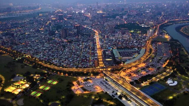 hyperlapse time lapse drone aeril view of night busy city heavy traffic metropolis taipei taiwan