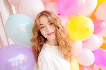 Fototapeta na wymiar beautiful young woman with colorful balloons, valentines day concept. Party or Birthday concept with Copy Space.