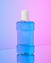 Blue mouthwash and dental care. Hygiene healthy. Cleaning the teeth.