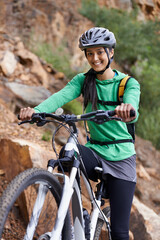 Woman, mountain bike and portrait with smile, adventure and helmet for safety, fitness and health....