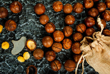 Organic Macadamia nut on wooden table, helthy food