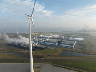 SustainableClimateVisuals Datacenter using sustainable energy produced by wind turbines. Eemshaven,...