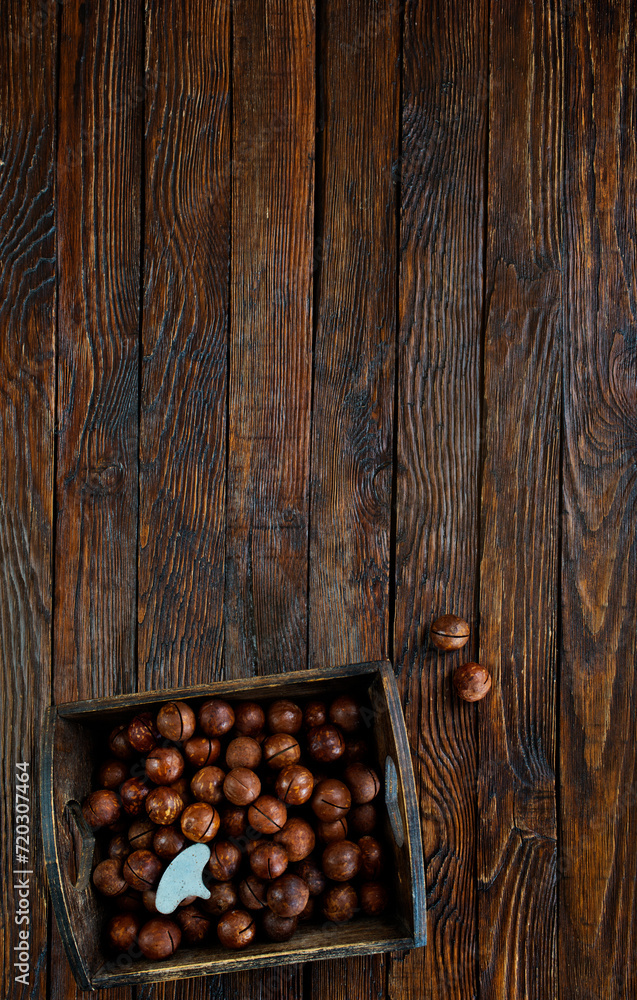 Wall mural a pile of roasted macadamia nut on a table