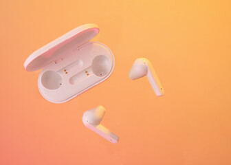 Wireless white headphones. Music, communication, fashion accessory.