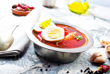 Traditional Ukrainian Russian borscht . Bowl of red beet root soup borsch with boiled egg - 720308644