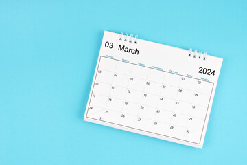 March 2024, Monthly desk calendar for 2024 year on blue background.