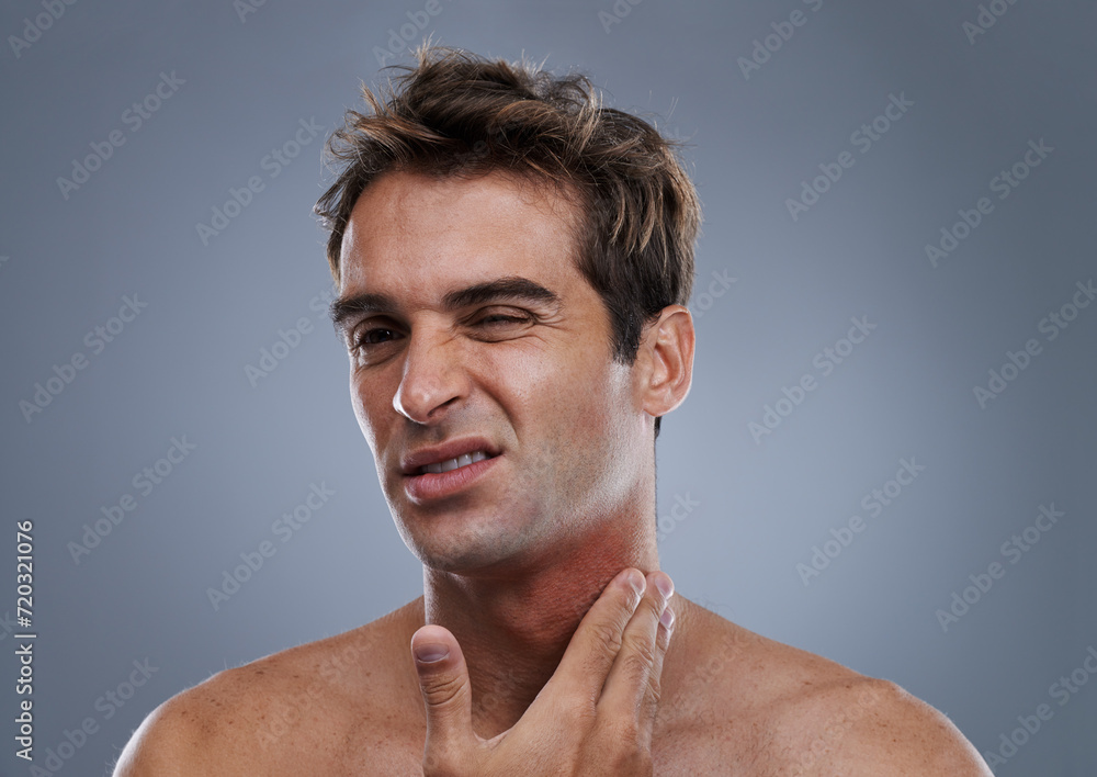 Poster Man, shave and rash pain from razor burn for hair removal for hygiene maintenance, mistake or grey background. Male person, hand and unhappy in studio or care fail in inflammation, itchy or mockup