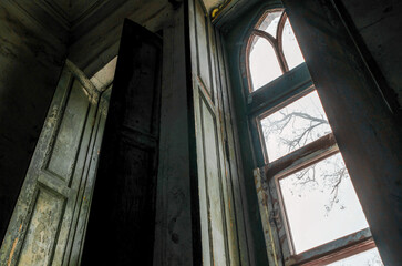 view from the window of an abandoned abandoned house in Ukraine