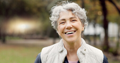 Senior woman with a smile, portrait in the park and happiness in nature, woods or outdoor for a walk in retirement. Happy, face and elderly person with wellness from exercise or healthy workout - obrazy, fototapety, plakaty