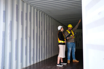 Employee working at shipping container