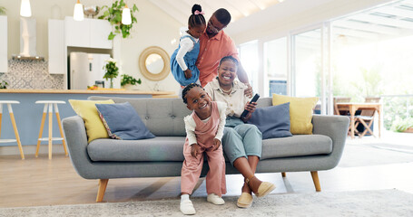 Happiness, playful parents and kids on sofa, black family having fun and smile in home together....