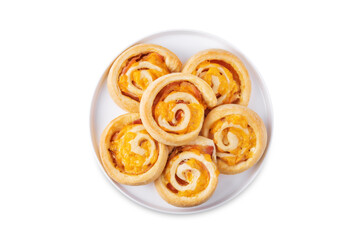 Bacon Cheddar cheese roll cake pinwheel on a white isolated background