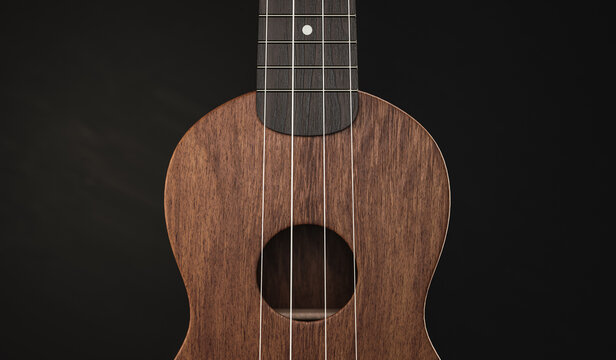 Hawaiian ukulele on black background, close-up with blur on front view, 3D rendering