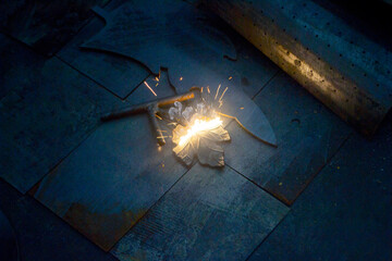 Laser cleaning of metal. The laser beam cleans the metal surface from rust. Laser removes removing...