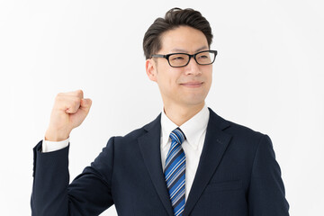 ガッツポーズするビジネスマン