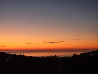 Naklejka premium sunset over the city