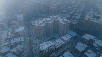 Aerial photography over Bucharest city. Fly over Bucharest City in winter season. Snowy day over...