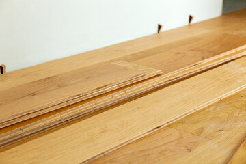 Oak parquet planks during installation. - 720425230