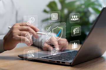 Standard Quality control and business management concept, Businessman use laptop plan quality...