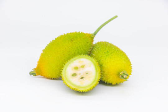 Spiny gourd or spine gourd also known as bristly balsma pear, prickly carolaho isolated on white background