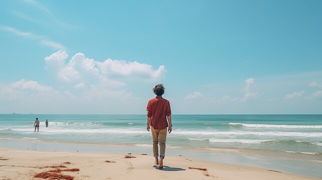 Person in red shirt walking on sunny beach, serene day background, wallpaper