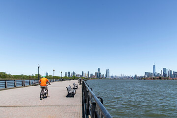 Panoramic view from the over water foot and bike path in Liberty State Park, Jersey City, NJ, USA...