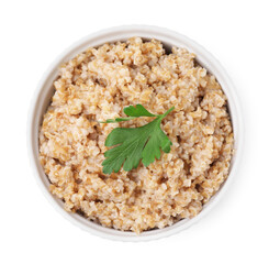 Tasty wheat porridge with parsley in bowl isolated on white, top view