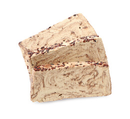Pieces of tasty chocolate halva isolated on white, top view