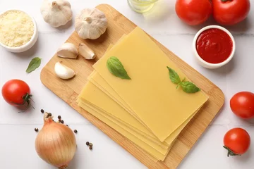 Foto op Plexiglas Ingredients for lasagna on white tiled table, flat lay © New Africa