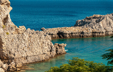High cliffs in St. Paul's Bay in Rhodes in Greece.