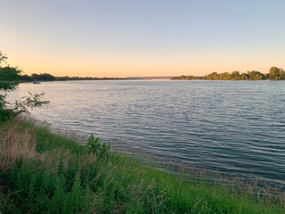 The sun rising over the Columbia River in Richland, Washington