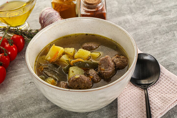 Soup with meatball and potato