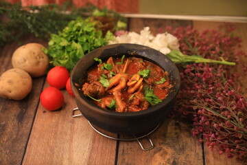 country chicken legs curry closeup with selective focus and blur
