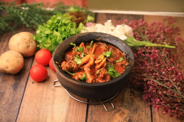 country chicken legs curry closeup with selective focus and blur